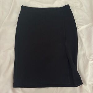 PrettyLittleThing black mini skirt